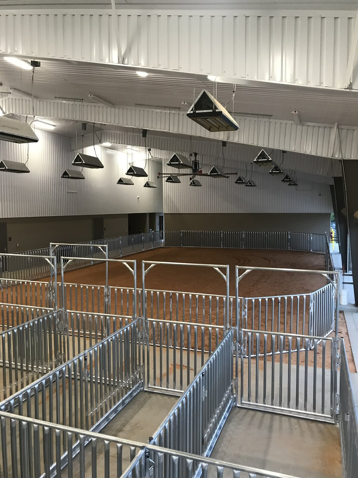 Galvanized show pens and arena inside the Killeen ISD livestock barn